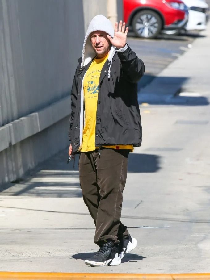 Black Hooded Jacket with Yellow Tee and Brown Pants